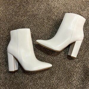 White faux leather ankle booties
